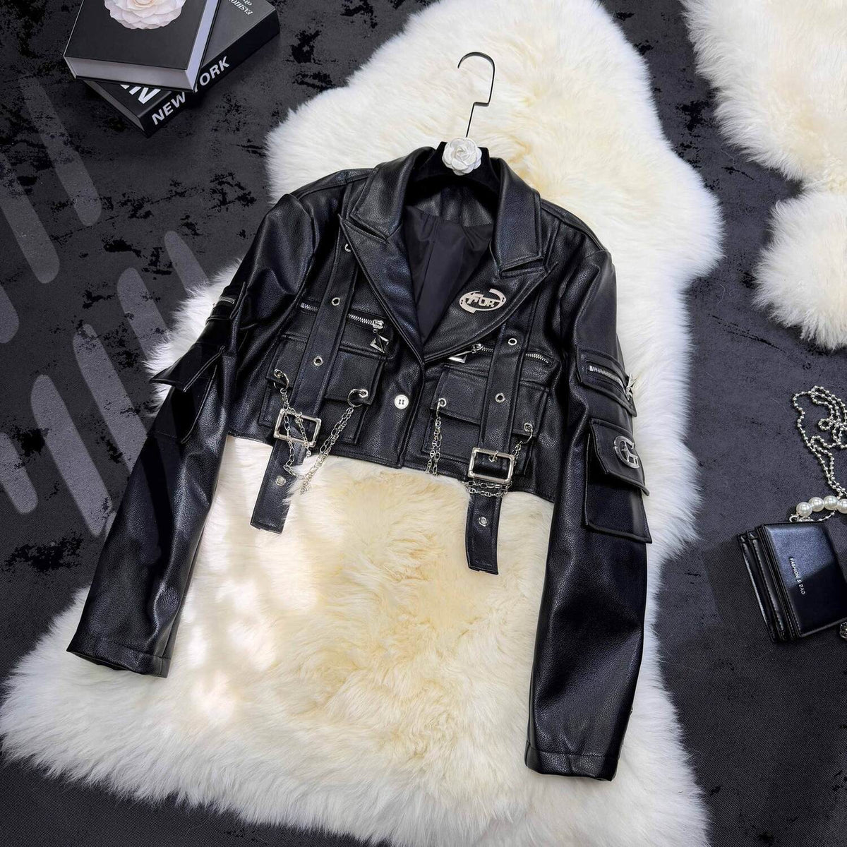 Trendy, edgy women's PU leather jacket featuring a metallic chain detail on the collar; a cool, biker-style cropped jacket perfect for spring and autumn. 👉 (30% advance payment) vibrant vogue (last picture for size chart